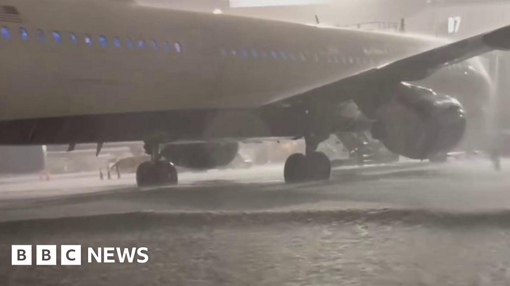 Waves form on severely flooded airport runway in Florida