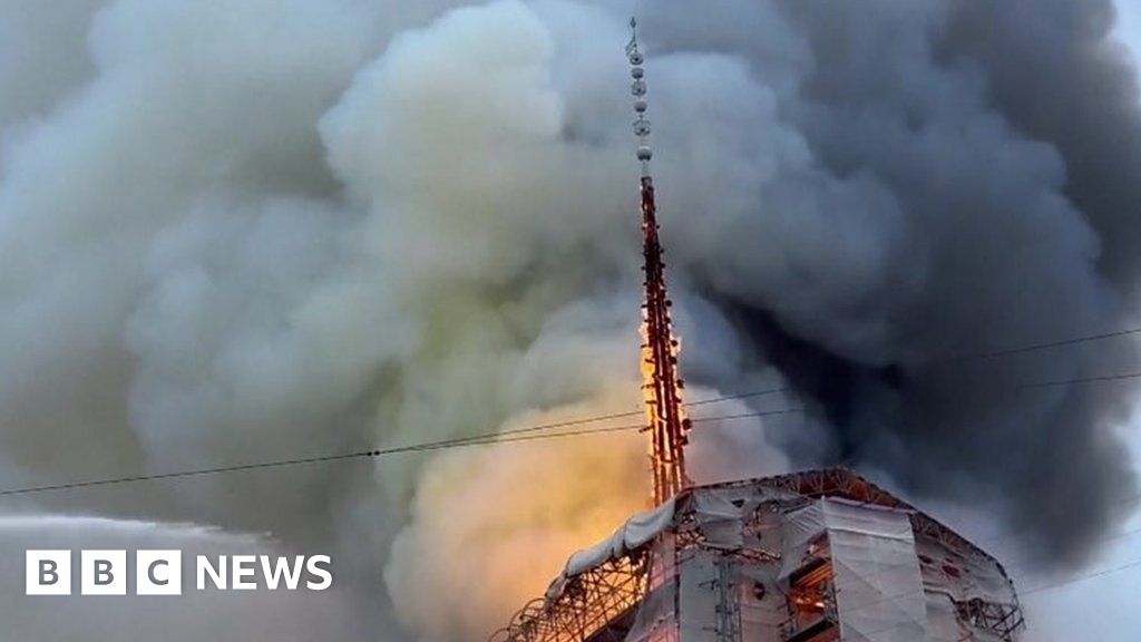 Watch moment spire collapses at Copenhagen stock exchange