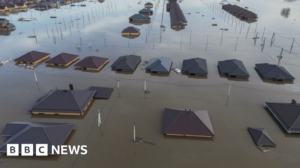 Russia floods leave houses almost submerged
