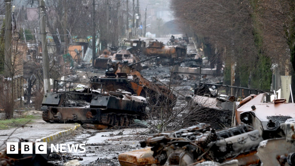 Ukraine war: Bucha street littered with burned-out tanks and corpses