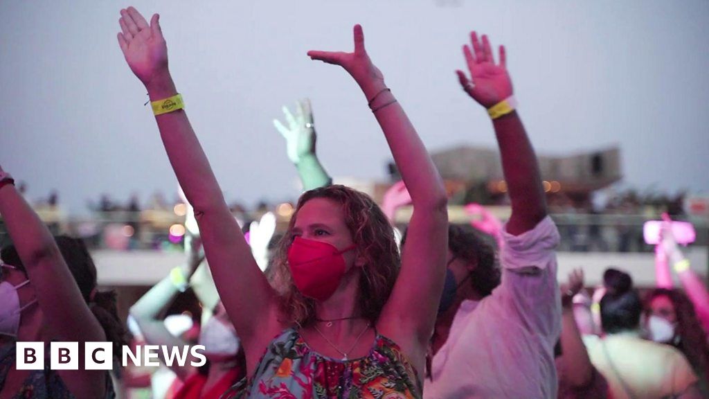 Covid pandemic: Key workers in Ibiza dance experiment