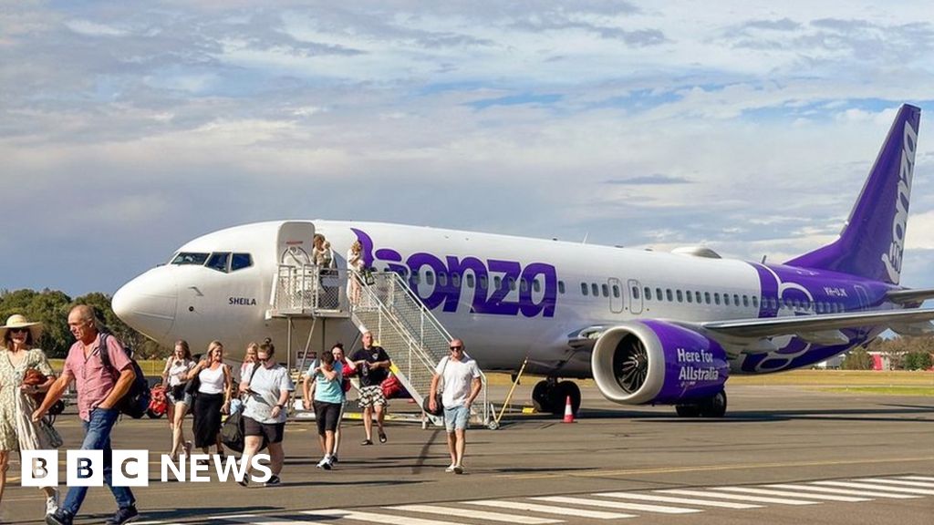 Thousands stuck after Australian airline suspends flights