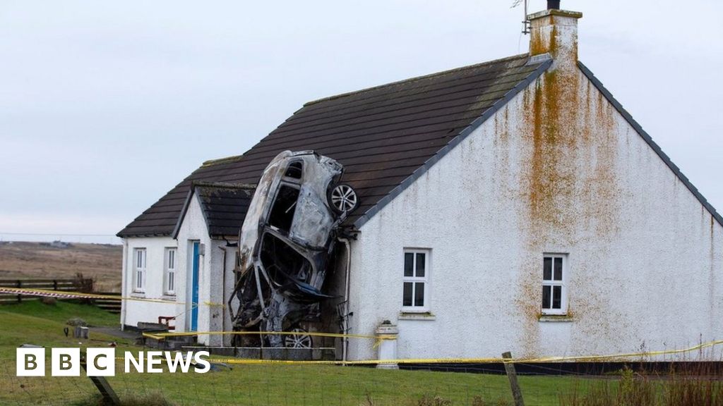 Three injured after car crashes into Lewis house and catches fire