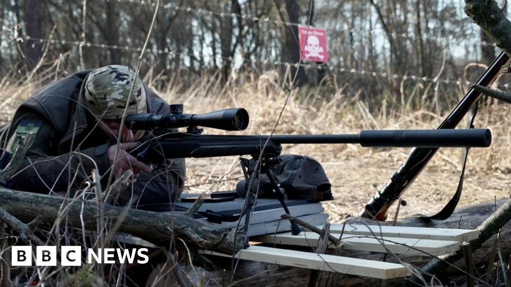 Ukraine's recruits swap spreadsheets for sniper rifles to defend Kyiv