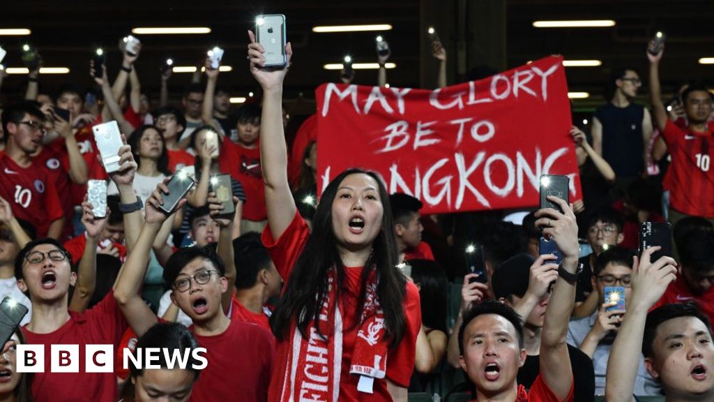 Hong Kong protesters sing and boo China anthem