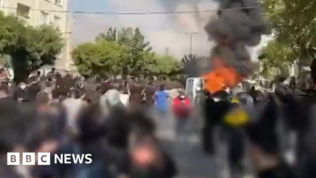 Hadis Najafi: Iran police clash with mourners of female protester