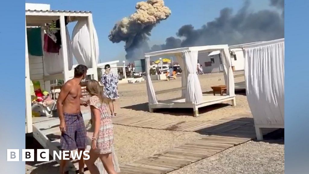 Crimea beachgoers run after airfield explosion