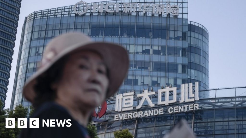 Evergrande Crisis Hit Firm Strikes China Debt Deal Bbc News