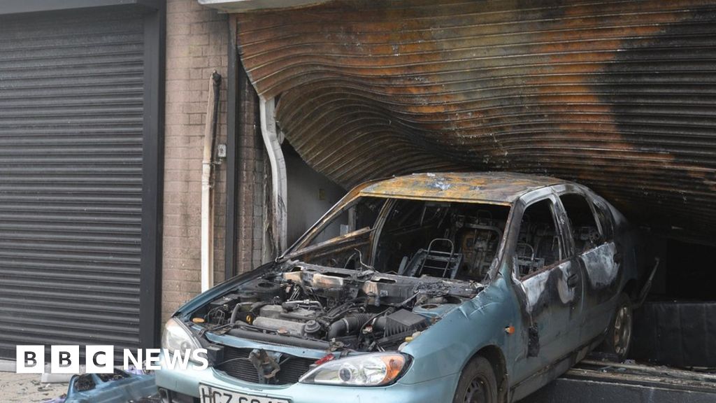 Larne hair salon damaged in fire attack - BBC News