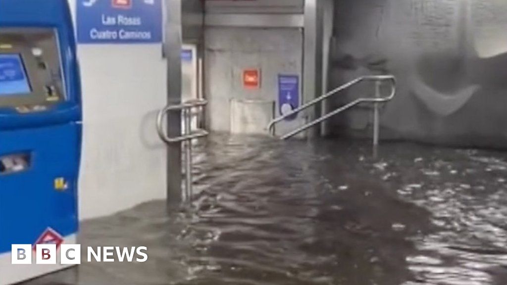 Waist-deep floodwaters in Madrid metro after storm