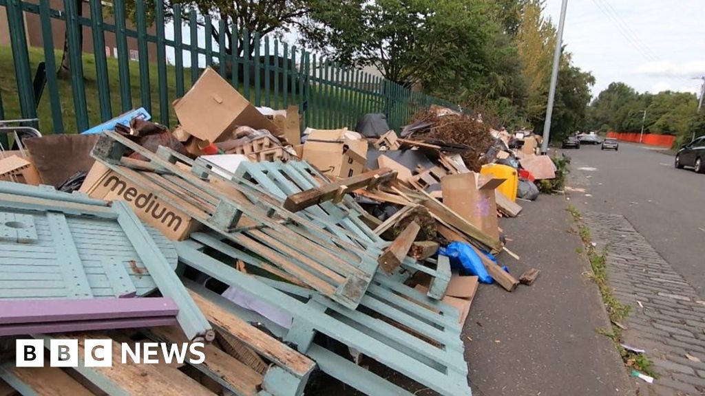 Rubbish dumped on pavement outside Glasgow's Dawsholm Recycling Centre