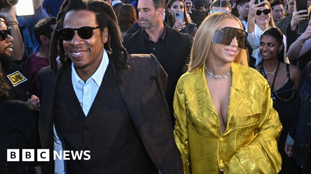 Beyonce, Jay-Z and Rihanna watch as Pharrell Williams takes over Paris  Fashion Week - BBC News