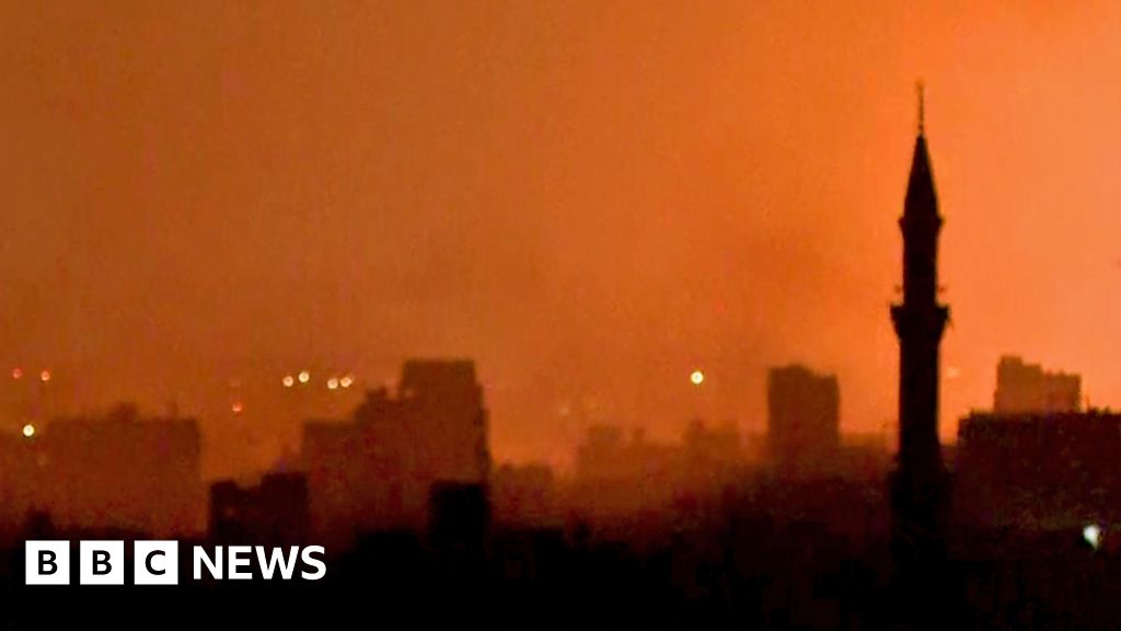 Explosions seen as Gaza Strip in darkness