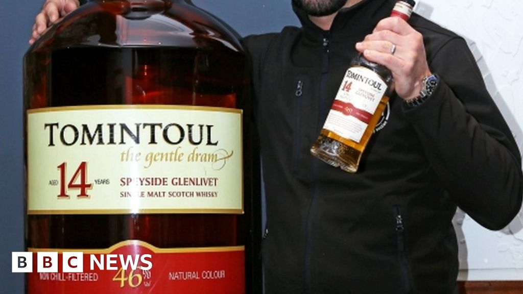World's biggest bottle of single malt whisky sold for £15k BBC News