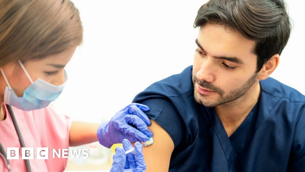 England’s Deputy Chief Medical Officer Urges Vaccinations for Covid-19 and Flu ahead of Challenging Winter