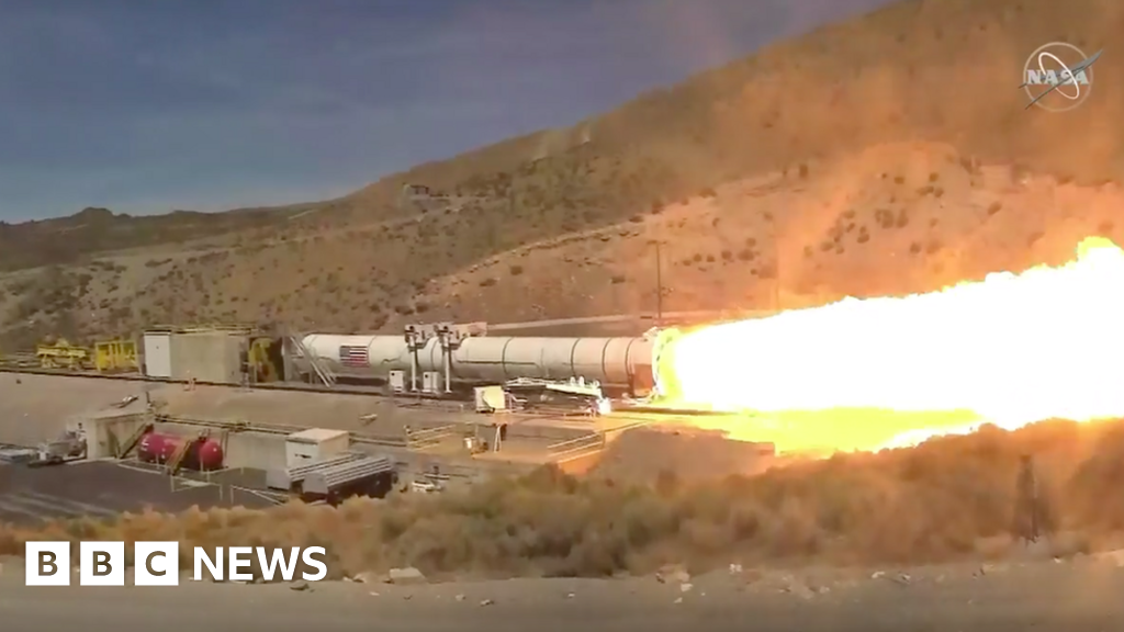 Moon booster rocket fired up in critical test - BBC News