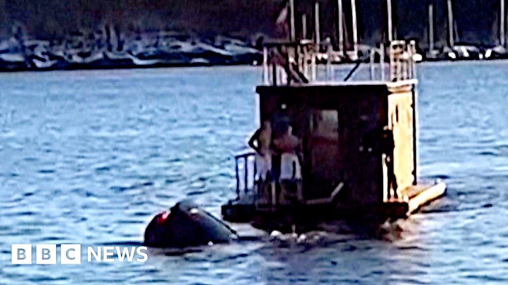 Watch: Tesla Norway fjord crash passengers saved by floating sauna users