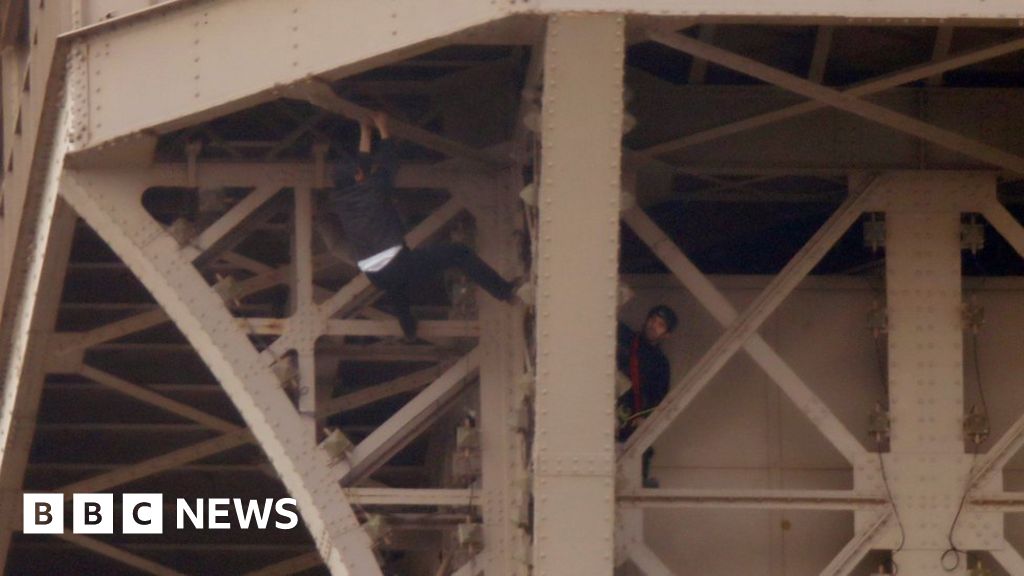 Eiffel Tower Climber In Custody After Reaching Top - BBC News