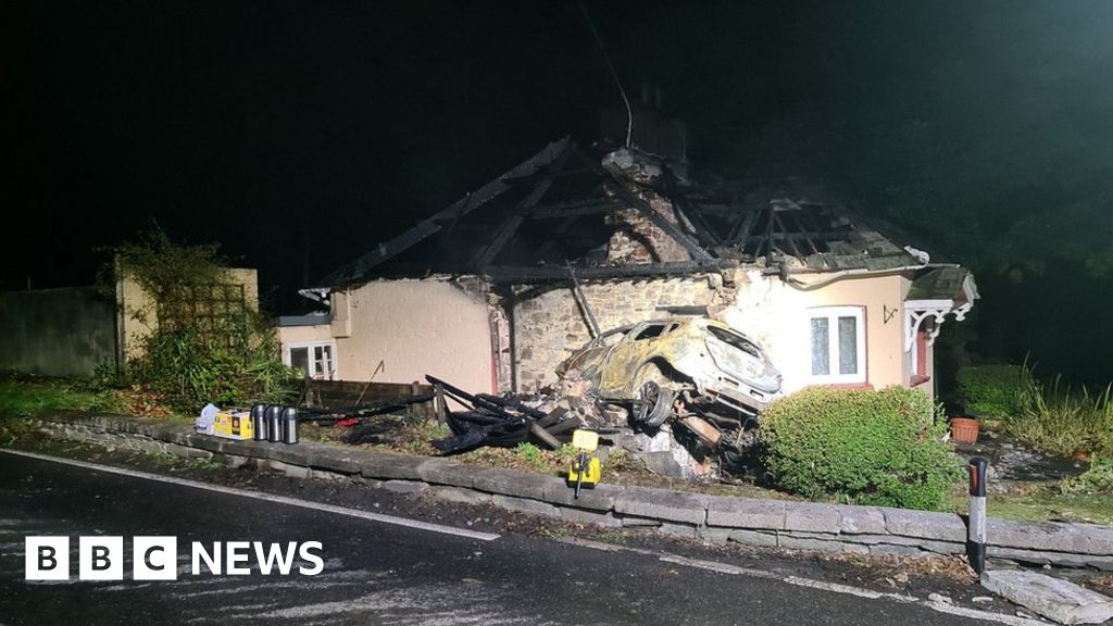 A38 crash: Arson arrest after car crashes into house