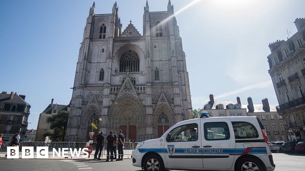Suspect in Nantes cathedral fire held over French priest's killing