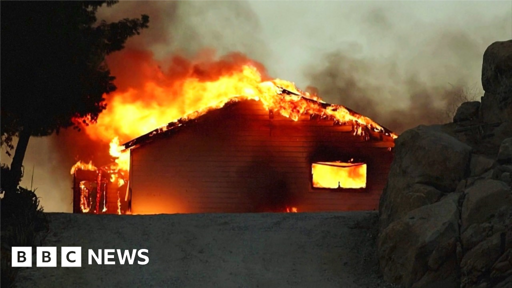 California wildfires: Two dead and mass evacuations amid heatwave