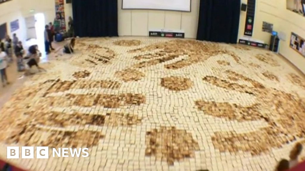 School attempts to burn up world's largest toast mosaic BBC News