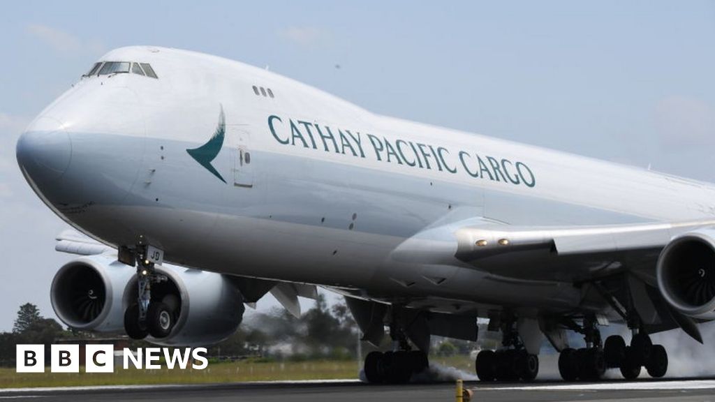 Covid: Cathay Pacific flights cut after Hong Kong clampdown