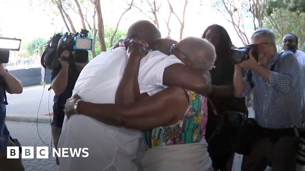Man hugs and reunites with family after 34 years in prison