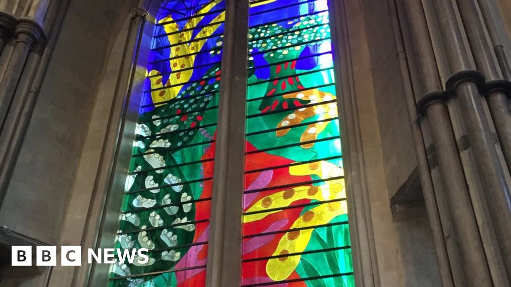 Queen's stained glass window revealed