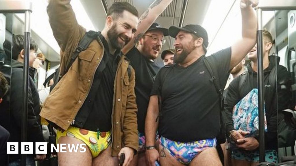 No Trousers Tube Ride: Trouserless travellers take to Tube for event - BBC  News