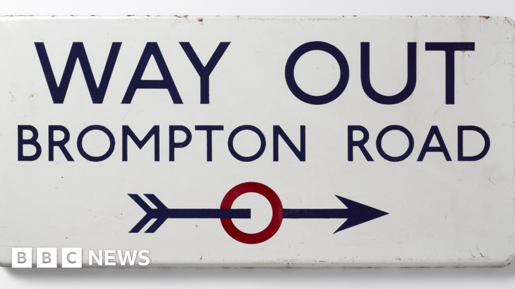 Johnston's Way Out sign for Brompton Road underground station