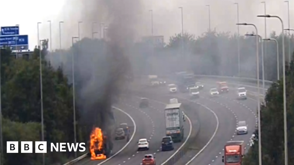 Bus fire forces partial closure of M74 motorway near Glasgow