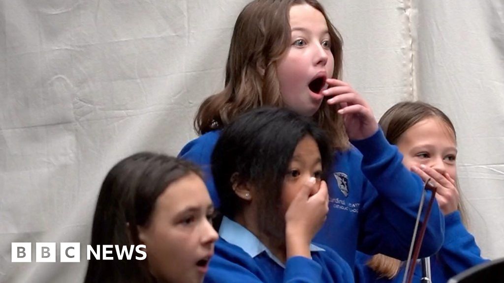 Watch students shocked when they learn they will sing for the king