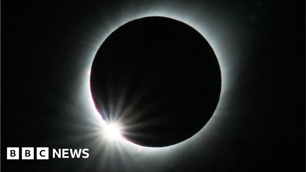 Solar eclipse: Thousands flock to remote Australian town for rare celestial event