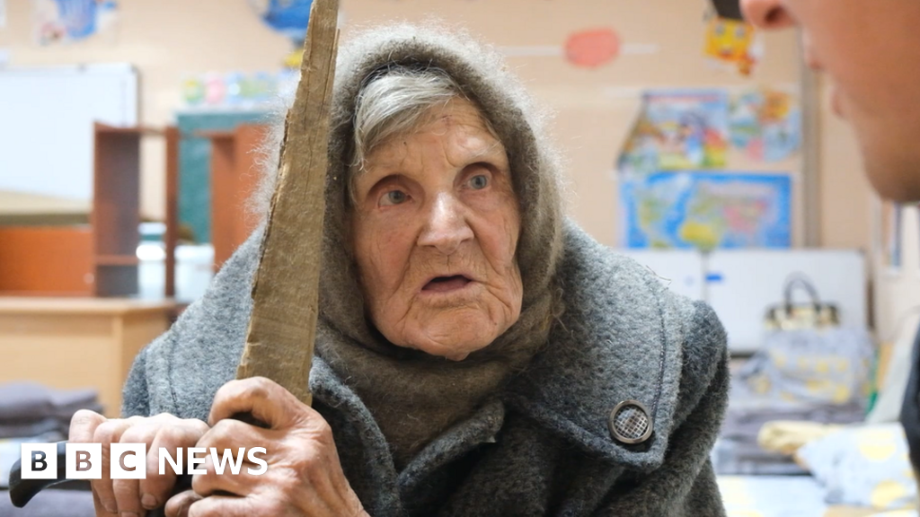 Ukrainian woman, 98, walks six miles from occupied village to safety - BBC News