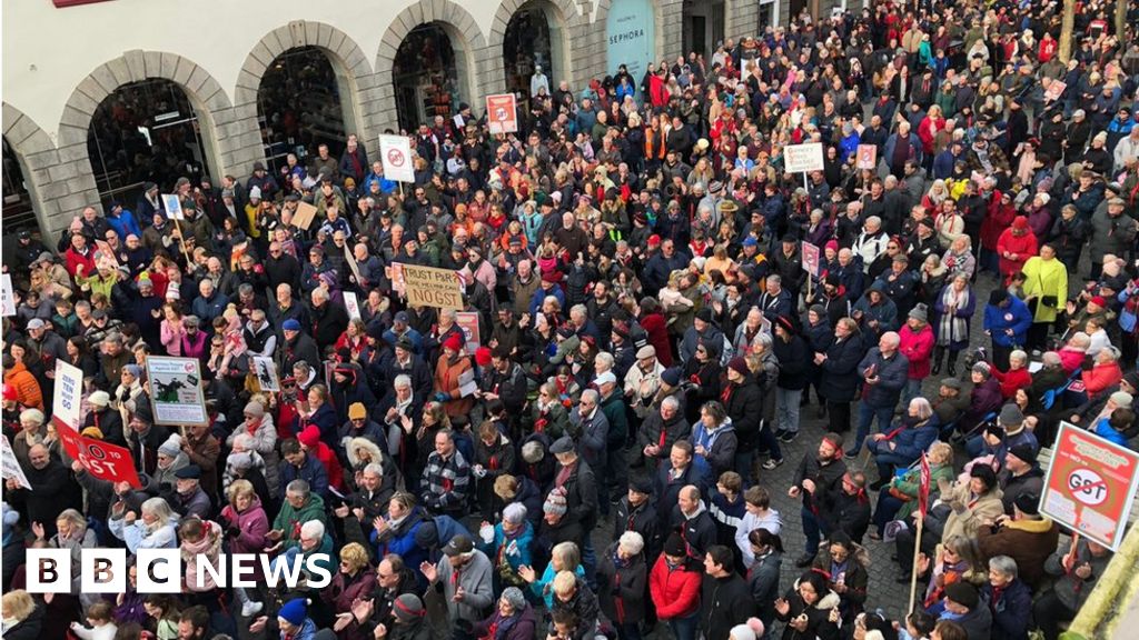 Guernsey protesters rally against goods and services tax plan BBC News