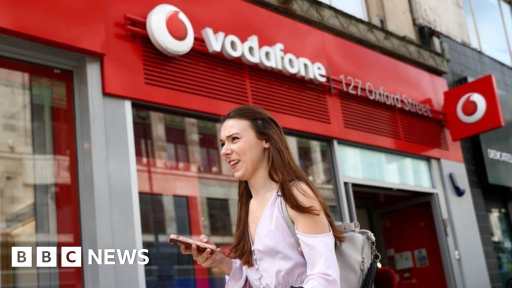 Vodafone Cuts Payout To Shareholders