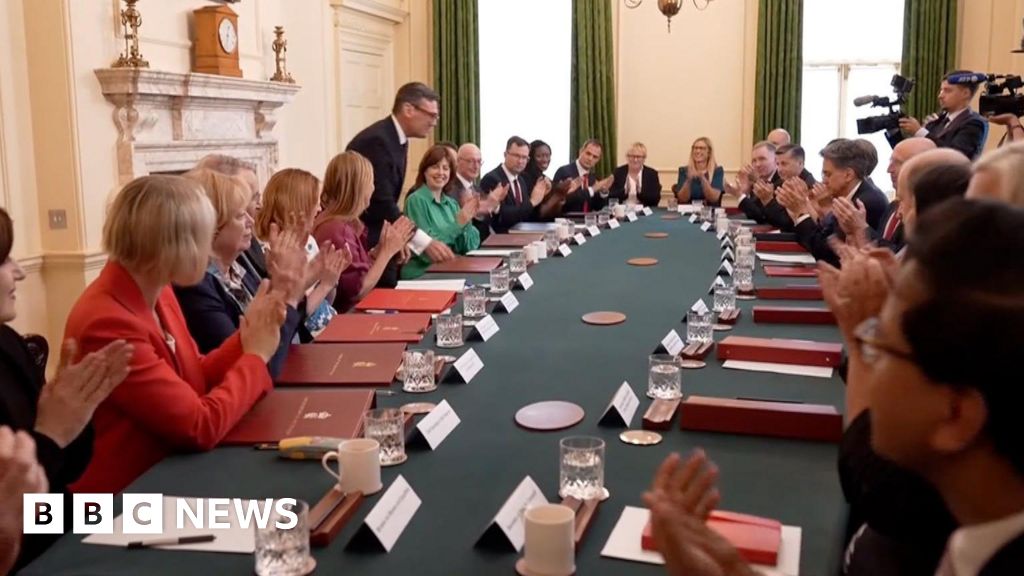 Applause as Burnham arrives for first cabinet meeting as PM