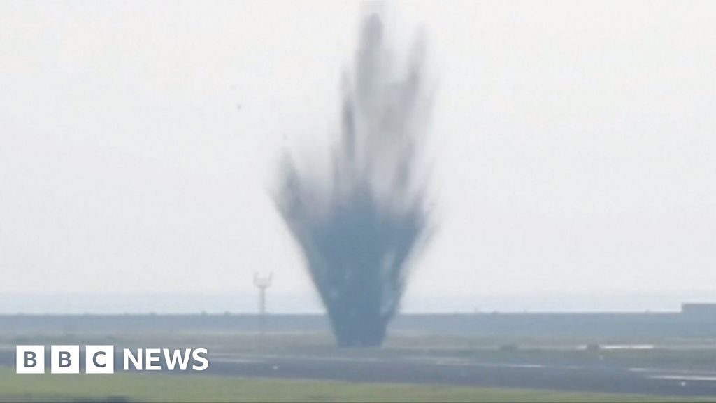 Hidden runway bomb explodes just after plane takes off