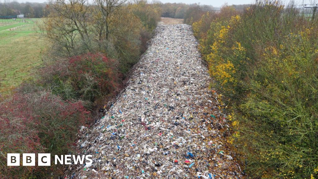 Fly-tippers bury field in mountain of waste