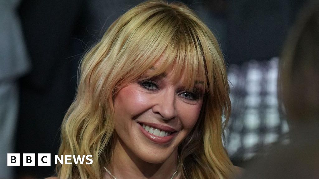 Kylie Minogue says cancer experience 'still with me'