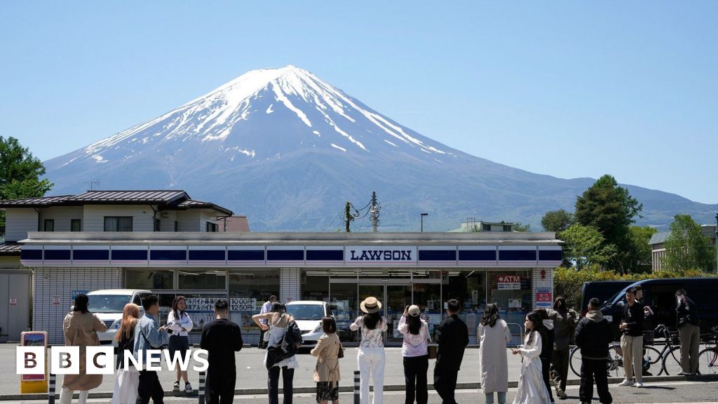 Mount Fuji: Japan blocks iconic view to deter tourists – BBC News