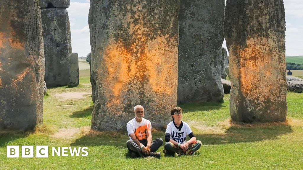Just Stop Oil trio cleared over Stonehenge orange powder protest