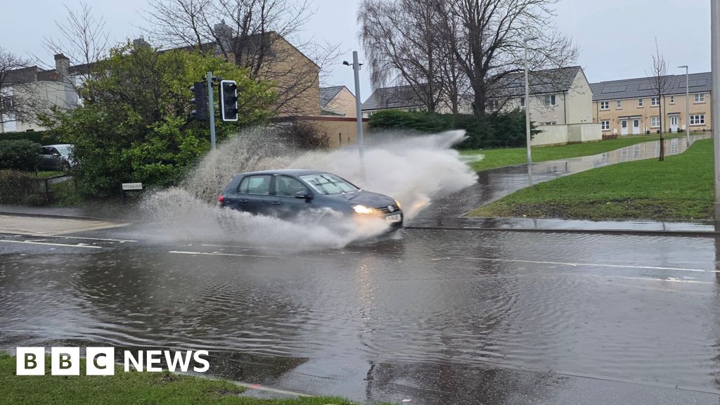 Ice and flood warnings for parts of UK as cool weather continues