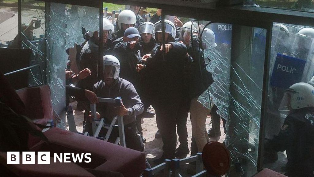 Turkish riot police storm opposition offices after leaders ousted