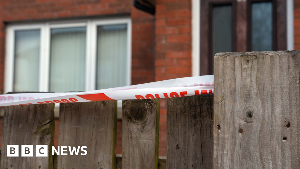 Murder inquiry launched after body of woman found in house