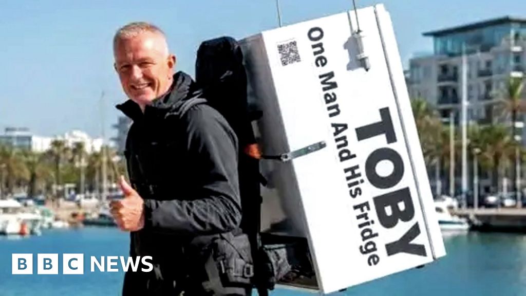 Where did fridge-carrying fundraiser's donations go?