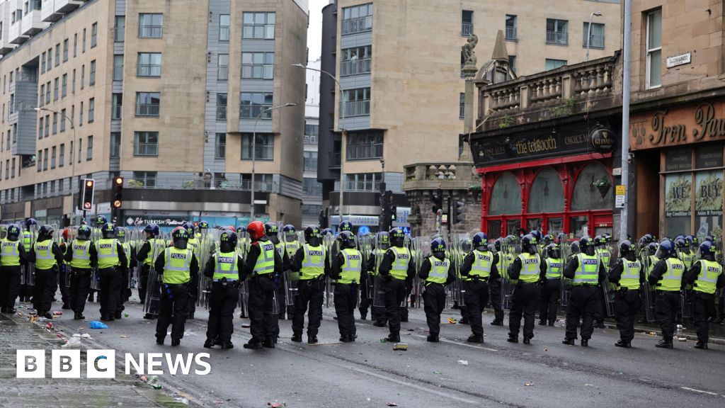 Riot police deal with 'serious disorder' as Celtic fans celebrate Premiership title win