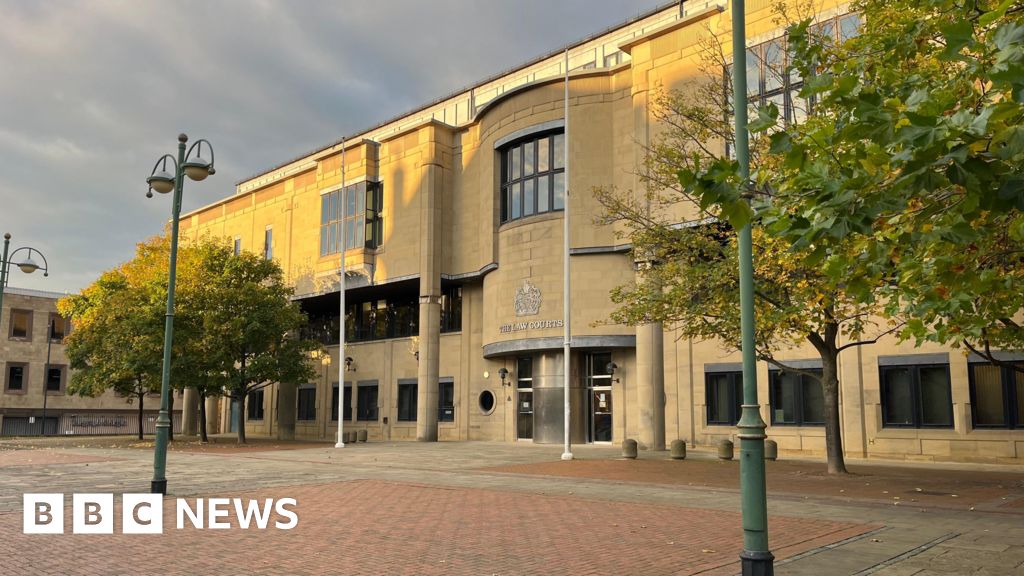 Cottingley man appears in court charged with murder of woman - BBC News