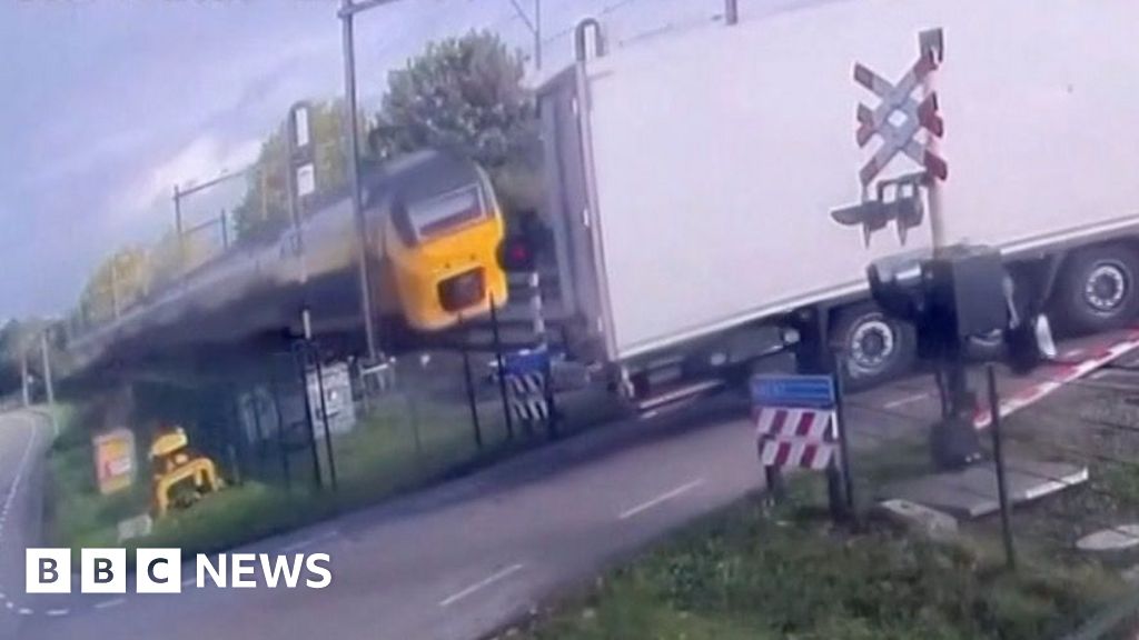 Watch: Train smashes into truck at Dutch level crossing